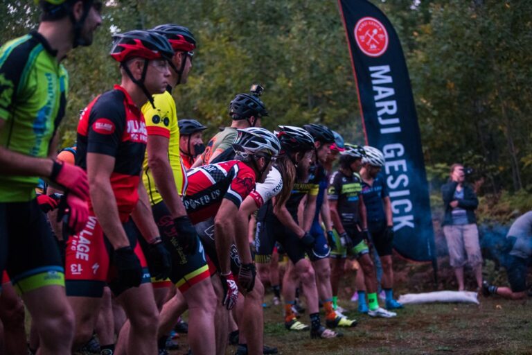 racers getting ready to run to their bikes form the starting line