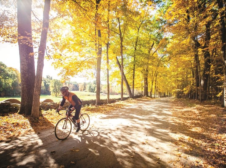 Solo rider on gravel trail in New England