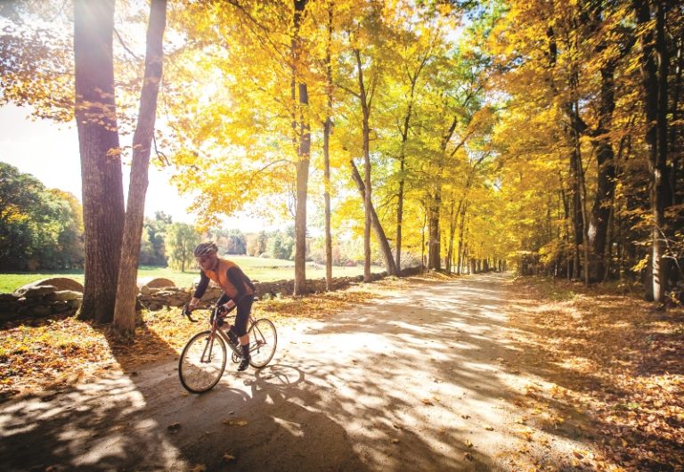 Solo rider on gravel trail in New England