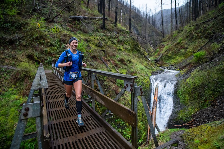 trail runner at gorge waterfalls