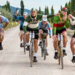 gravel cyclists in italy on vintage bikes