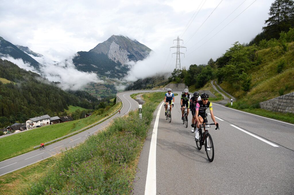 riders ascending a pass in tour of mont blanc