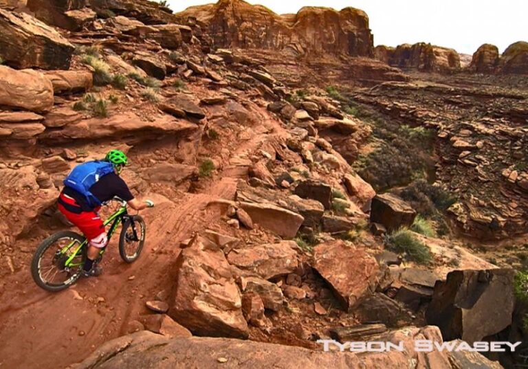 Rider on a narrow trail near Moab UT