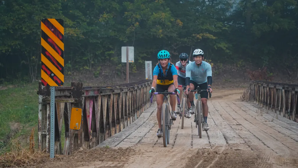 Riders crossing a bridge in Glenwood Superbloom event