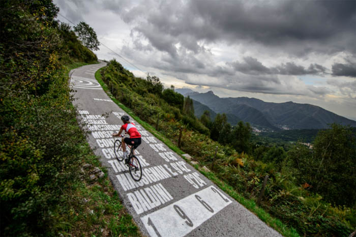 Solo rider on steep climb in Gran Fondo Il Lombardia