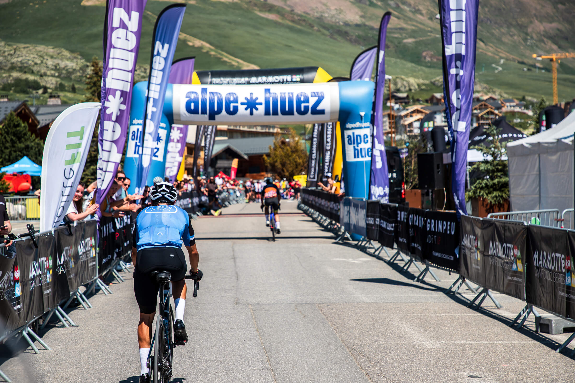 Riders at the finish line of Marmotte Gran Fondo Alpes