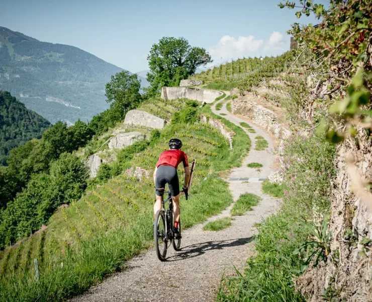 Solo riding climbing on route of UCI Gravel Suisse