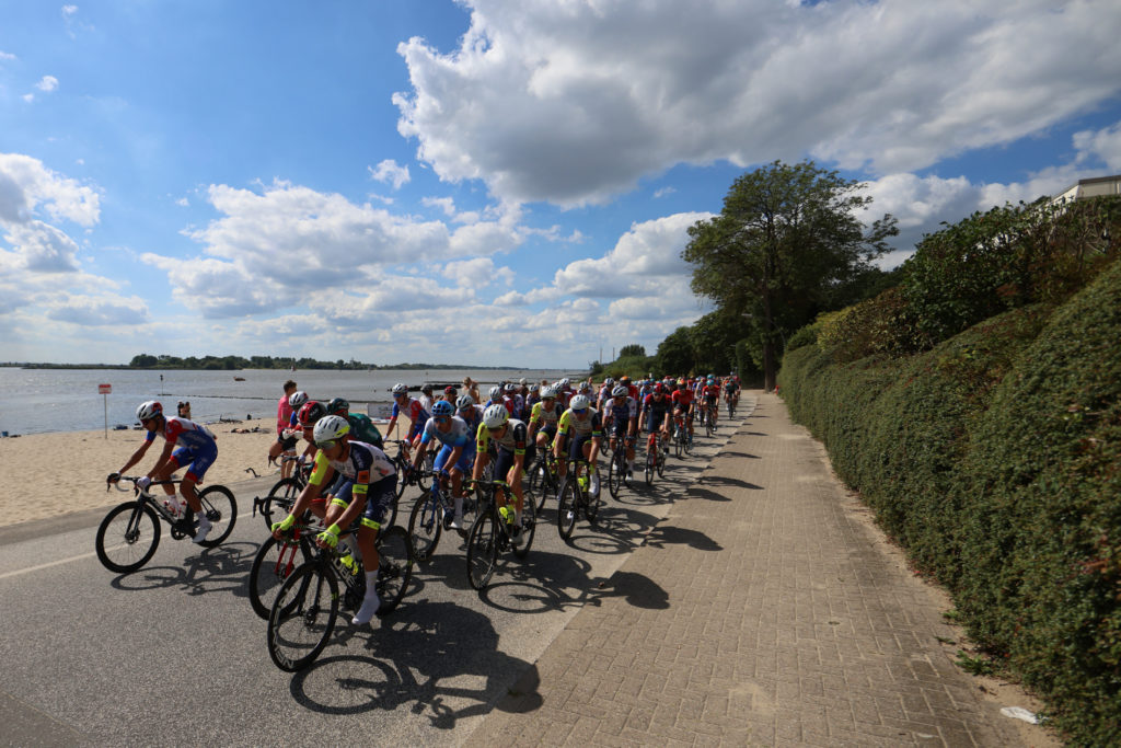 Large group of riders on course of Bremer Cyclassics near Hamburg